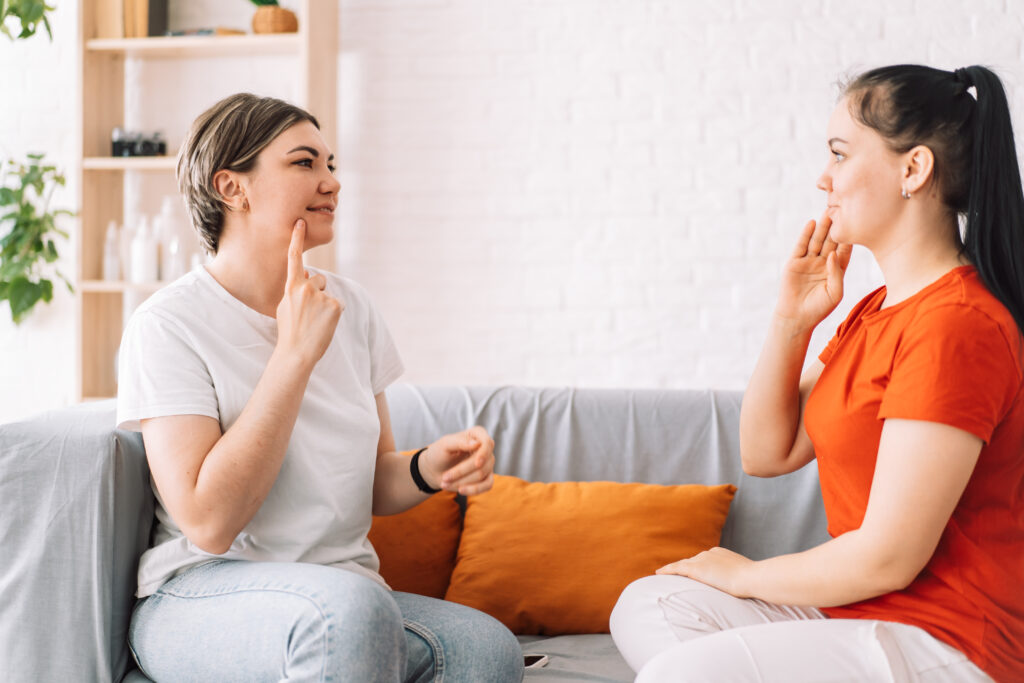 Therapist demonstrating exercise to their patient